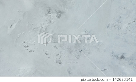Light gray weathered concrete surface with peeling paint and stains for grunge background Light gray weathered concrete surface with peeling paint and stains for grunge background 142683141