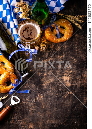Bavarian brezel and beer, Oktoberfest food Bavarian brezel and beer, Oktoberfest food 142683770
