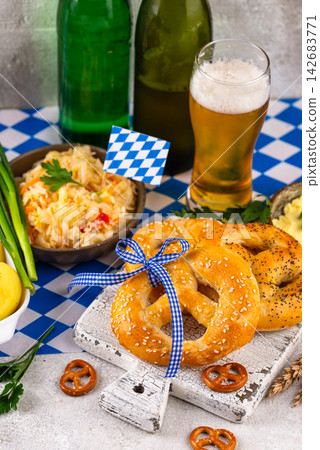 Oktoberfest food: beer, pretzel, sausages, stewed cabbage, potato Oktoberfest food: beer, pretzel, sausages, stewed cabbage, potato 142683771