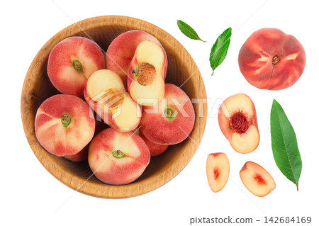 chinese flat donut peaches in wooden bowl isolated on white background. Top view. Flat lay chinese flat donut peaches in wooden bowl isolated on white background. Top view. Flat lay 142684169