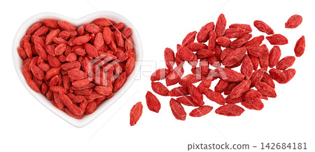 Dried goji berries in ceramic bowl isolated on white background. Top view. Flat lay. Dried goji berries in ceramic bowl isolated on white background. Top view. Flat lay. 142684181