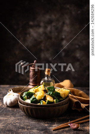 Asian style marinated cucumber with chili 142684296
