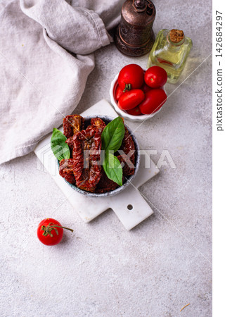 Sun dried tomatoes, traditional italian food Sun dried tomatoes, traditional italian food 142684297