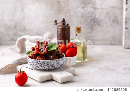 Sun dried tomatoes, traditional italian food Sun dried tomatoes, traditional italian food 142684298