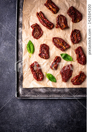 Sun dried tomatoes, traditional italian food Sun dried tomatoes, traditional italian food 142684300