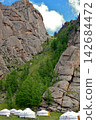 Rocky mountains and yurts at Bubeit Camp, Mongolia 142684472