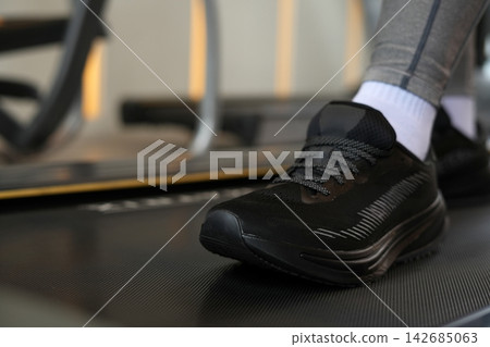 woman is walking for exercise in the gym. woman is walking for exercise in the gym. 142685063