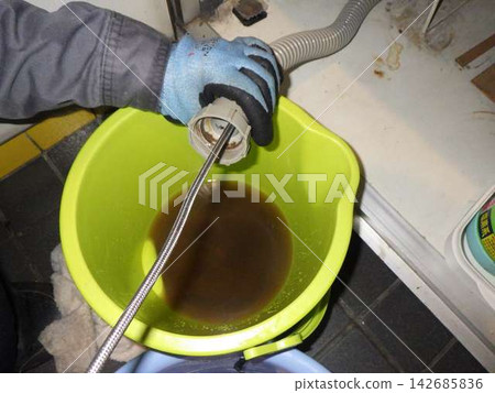 Plumbing repair work to remove blockages in drainpipes Plumbing repair work to remove blockages in drainpipes 142685836