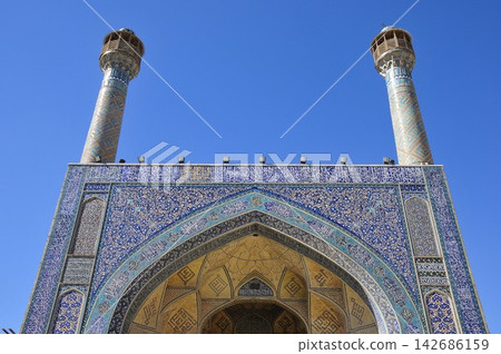 Iran, Isfahan, Friday Mosque, Jameh Mosque, iwan and minaret decorated with tiles 142686159