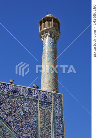 Iran, Isfahan, Friday Mosque, Jameh Mosque, minaret decorated with tiles Iran, Isfahan, Friday Mosque, Jameh Mosque, minaret decorated with tiles 142686160