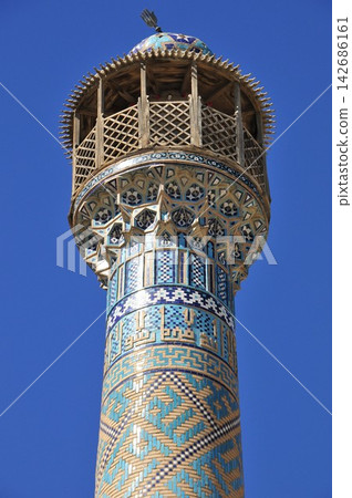 Iran, Isfahan, Friday Mosque, Jameh Mosque, minaret decorated with tiles Iran, Isfahan, Friday Mosque, Jameh Mosque, minaret decorated with tiles 142686161