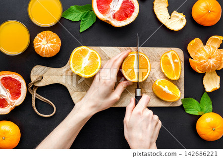 Fresh Citrus Fruit and Orange Juice Preparation Flat Lay Fresh Citrus Fruit and Orange Juice Preparation Flat Lay 142686221