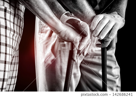 Golfers Hands Holding Clubs in Black and White Sports Close-Up Golfers Hands Holding Clubs in Black and White Sports Close-Up 142686241