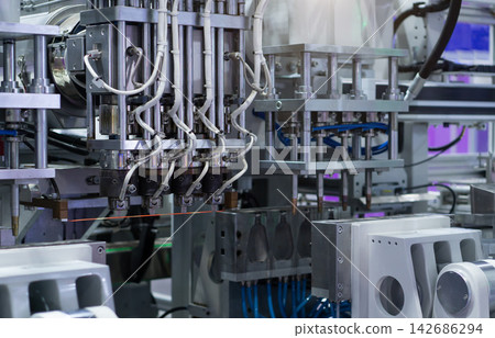 Automated Industrial Manufacturing Machine in Modern Factory Automated Industrial Manufacturing Machine in Modern Factory 142686294