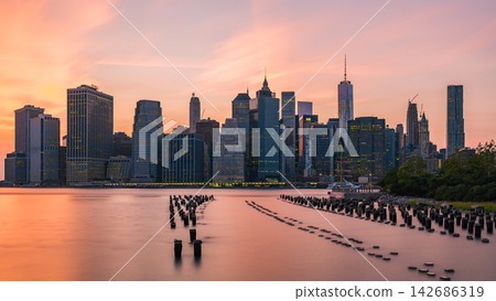 New York City Skyline at Sunset Over East River New York City Skyline at Sunset Over East River 142686319