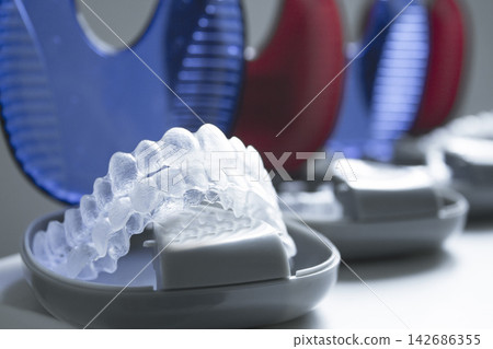 Clear Dental Aligners in Modern Orthodontic Clinic Close-Up Clear Dental Aligners in Modern Orthodontic Clinic Close-Up 142686355