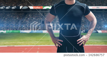 Athlete in Compression Shirt at Stadium Track 142686757