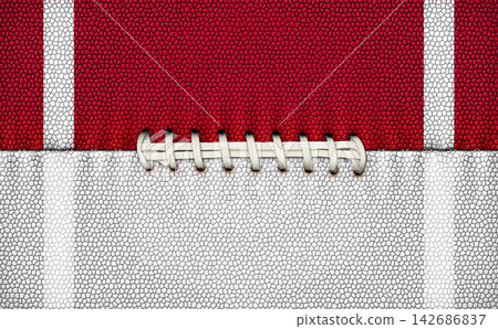 American Football Laces on Red and White Field Texture American Football Laces on Red and White Field Texture 142686837