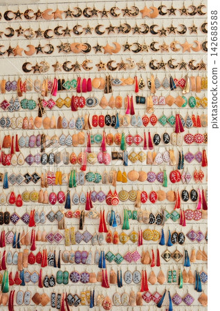 Iran, Isfahan, Imam Square, Bazaar, Islamic-style earrings, accessories 142688588