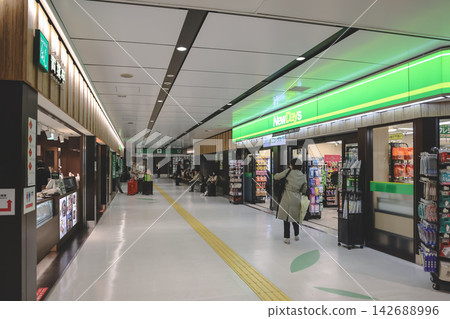 April 27 2026 Sendai Station corridor with convenience store and waiting passengers April 27 2026 Sendai Station corridor with convenience store and waiting passengers 142688996