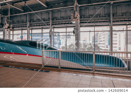 April 27 2026 Sendai Station platform with green Shinkansen and passengers waiting 142689014
