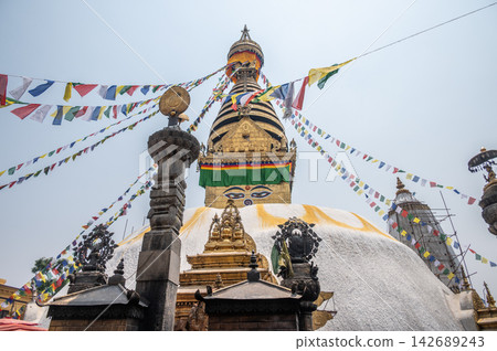 Beautiful view of Swayambhunath stupa in Kathmandu, Nepal. Swayambhunath is one of the most sacred religious sites in Kathmandu It was built by King Manadeva and by the 13th century. Beautiful view of Swayambhunath stupa in Kathmandu, Nepal. Swayambhunath is one of the most sacred religious sites in Kathmandu It was built by King Manadeva and by the 13th century. 142689243
