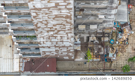 Aug 23 2026 Hong Kong aging building exterior and cluttered Aug 23 2026 Hong Kong aging building exterior and cluttered 142689850