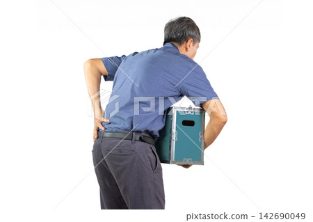 A senior man's backache was caused by lifting a heavy box. A senior man's backache was caused by lifting a heavy box. 142690049