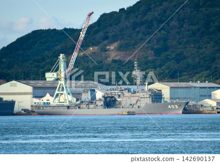 A Japan Maritime Self-Defense Force submarine rescue ship undergoing maintenance at a shipyard. A Japan Maritime Self-Defense Force submarine rescue ship undergoing maintenance at a shipyard. 142690137