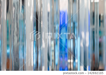 Soft-focused abstract background of vertical metallic strips Soft-focused abstract background of vertical metallic strips 142692185