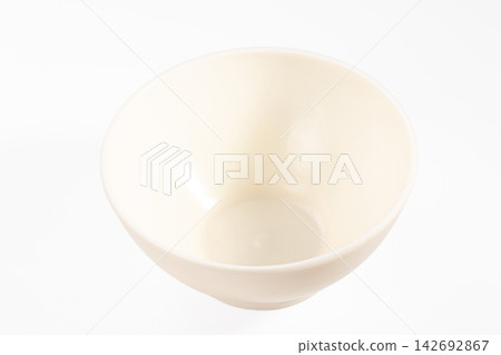 Empty off white ceramic bowl on plain white background, minimalist composition with soft shadows and clean lines Empty off white ceramic bowl on plain white background, minimalist composition with soft shadows and clean lines 142692867
