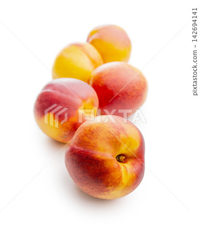 Fresh Ripe nestarines On White Background,  Close-Up Summer Fruit Still Life For Healthy Eating 142694141