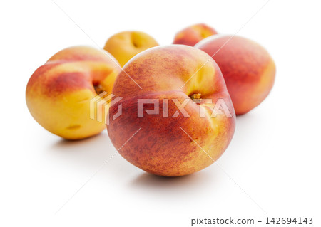 Fresh Ripe nestarines On White Background, Close-Up Summer Fruit Still Life For Healthy Eating Fresh Ripe nestarines On White Background, Close-Up Summer Fruit Still Life For Healthy Eating 142694143