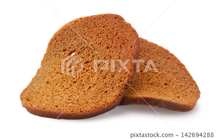 Rye bread rusks close-up on a white background. Isolated Rye bread rusks close-up on a white background. Isolated 142694288
