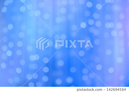 blurred focus of decorative lights in blue background blurred focus of decorative lights in blue background 142694584