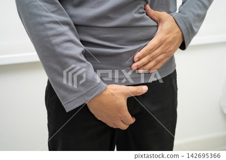 Hernia, Asian man stomach ache, abdominal pain and urology problem health. Hernia, Asian man stomach ache, abdominal pain and urology problem health. 142695366