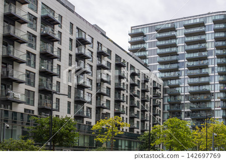 Modern residential apartment buildings in urban area Modern residential apartment buildings in urban area 142697769