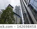 Low angle view of modern urban skyscrapers 142698458