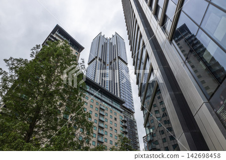 Low angle view of modern urban skyscrapers Low angle view of modern urban skyscrapers 142698458