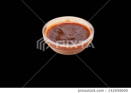 Delicious barbecue sauce in a glass bowl with transparent background Delicious barbecue sauce in a glass bowl with transparent background 142698600