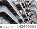 Exterior facade of contemporary apartment building 142699004