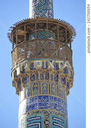 Iran, Isfahan, Imam Square, Imam Mosque, minaret decorated with tiles Iran, Isfahan, Imam Square, Imam Mosque, minaret decorated with tiles 142700854