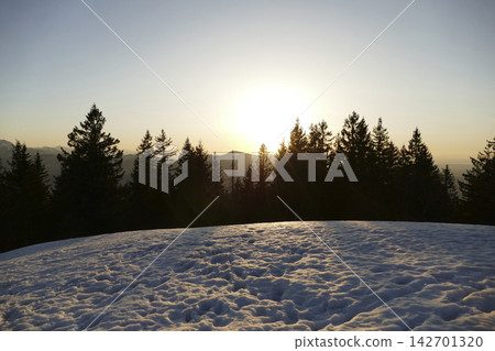 Sunset at Rechelberg mountain in wintertime, Bavaria, Germany Sunset at Rechelberg mountain in wintertime, Bavaria, Germany 142701320