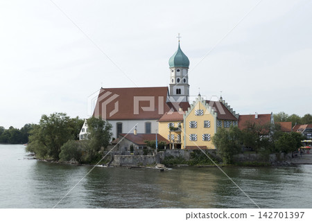 Parish church of St. George and rectory in Wasserburg on Lake Constance, Germany Parish church of St. George and rectory in Wasserburg on Lake Constance, Germany 142701397