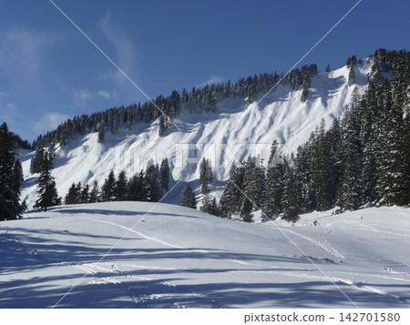 Mountain hiking at Brecherspitze mountain, Bavaria, Germany in wintertime Mountain hiking at Brecherspitze mountain, Bavaria, Germany in wintertime 142701580