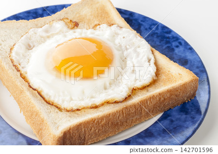 Fried egg toast Fried egg toast 142701596