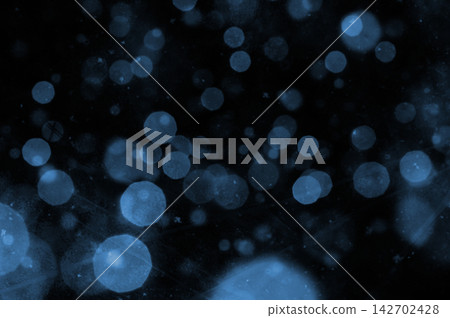 Black Background with Soft Blue Bokeh Lights and Abstract Glowing Light Effects Black Background with Soft Blue Bokeh Lights and Abstract Glowing Light Effects 142702428