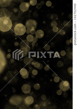 Black Background with Soft Yellow Bokeh Lights and Abstract Glowing Effects Black Background with Soft Yellow Bokeh Lights and Abstract Glowing Effects 142702440