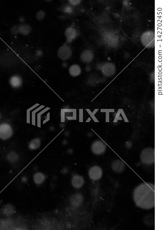 Black Background with Soft White Bokeh Lights and Abstract Glowing Effects Black Background with Soft White Bokeh Lights and Abstract Glowing Effects 142702450