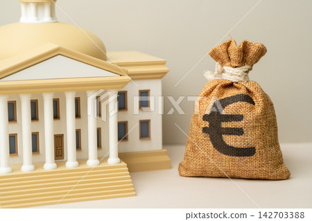 The Euro money bag and the government building. The national budget. Budget adoption in parliament, amendments. Revenues and expenditures, the national economy. Fiscal policy. Reserve currency. The Euro money bag and the government building. The national budget. Budget adoption in parliament, amendments. Revenues and expenditures, the national economy. Fiscal policy. Reserve currency. 142703388